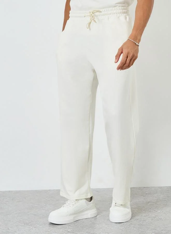 Styli  Men Cream Oversized T-Shirt and Drawstring Pants Co-Ords for Men | Best Price UAE